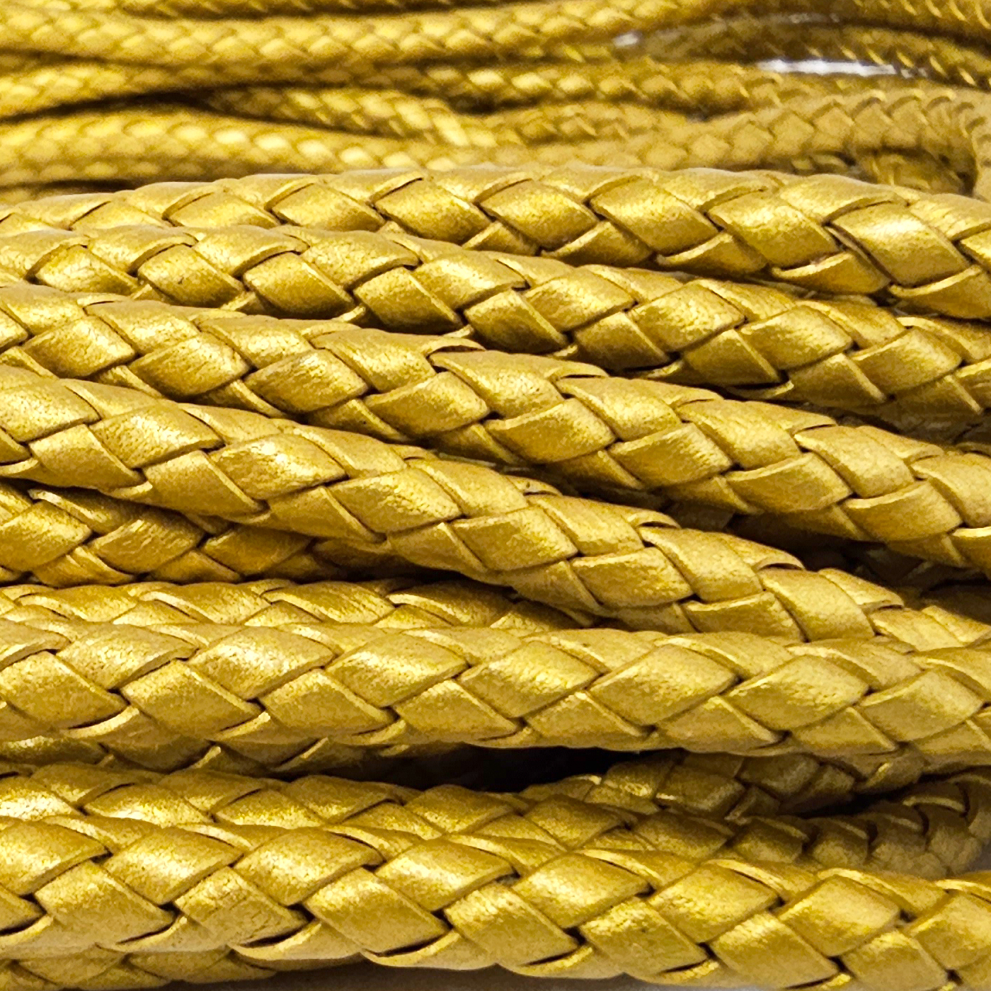 Lederschnur geflochten 5 mm - Gold. Länge: 20 m