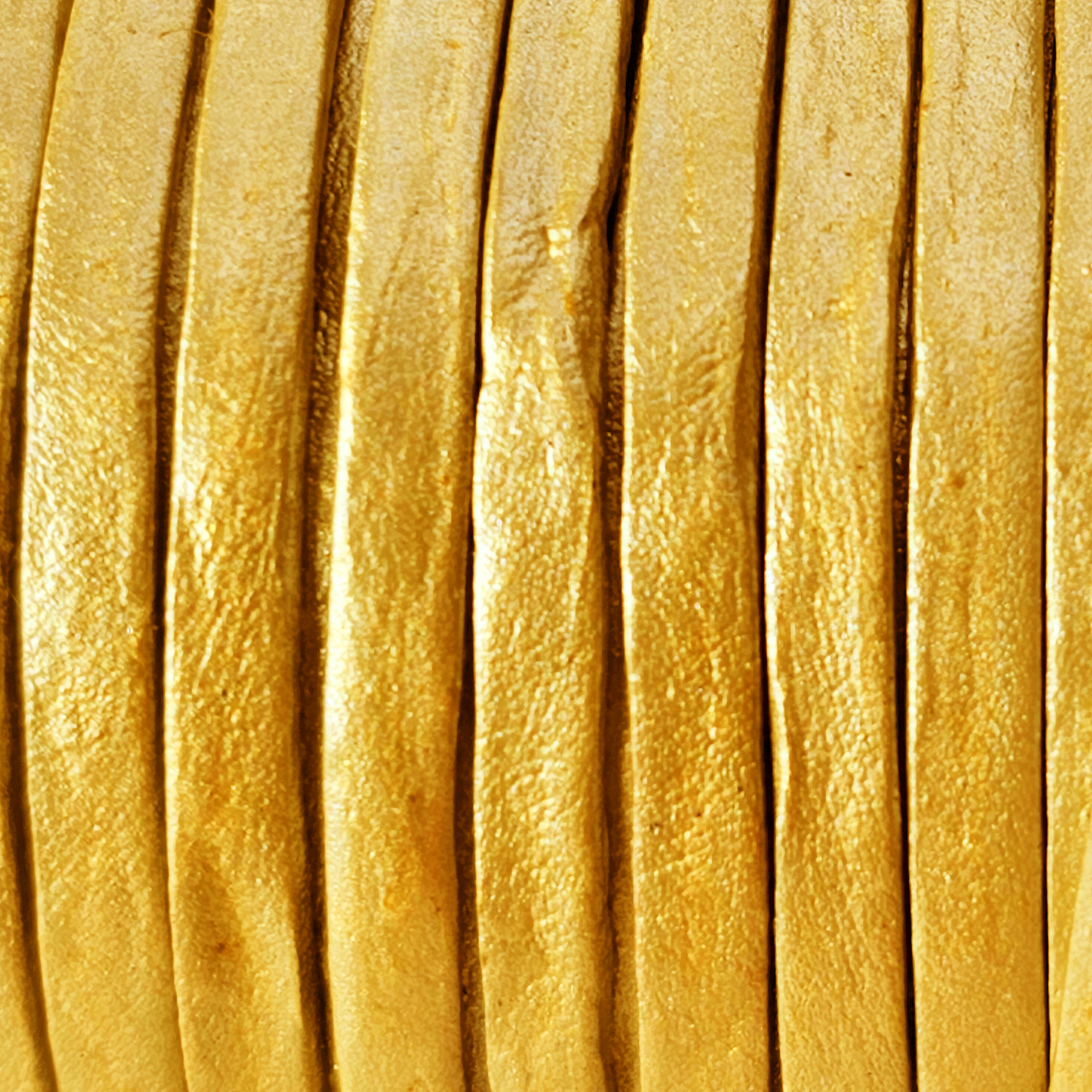 Lederband Flach 3 x 1 mm - Gold. Länge: 15 m