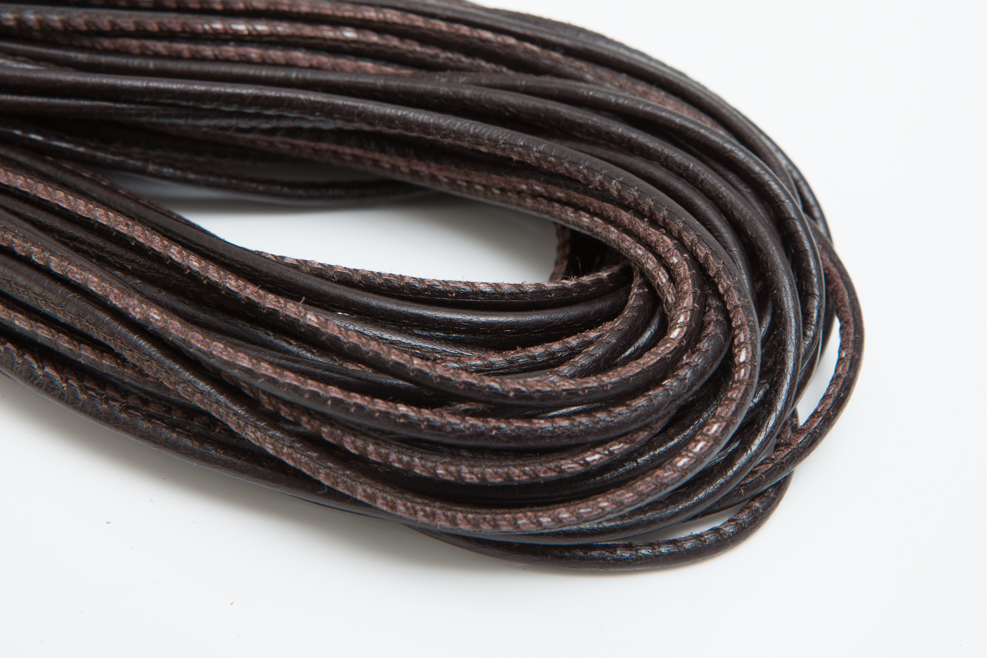 Lederschnur Rund gesäumt 2,5 mm - Braun. Länge: 1 m