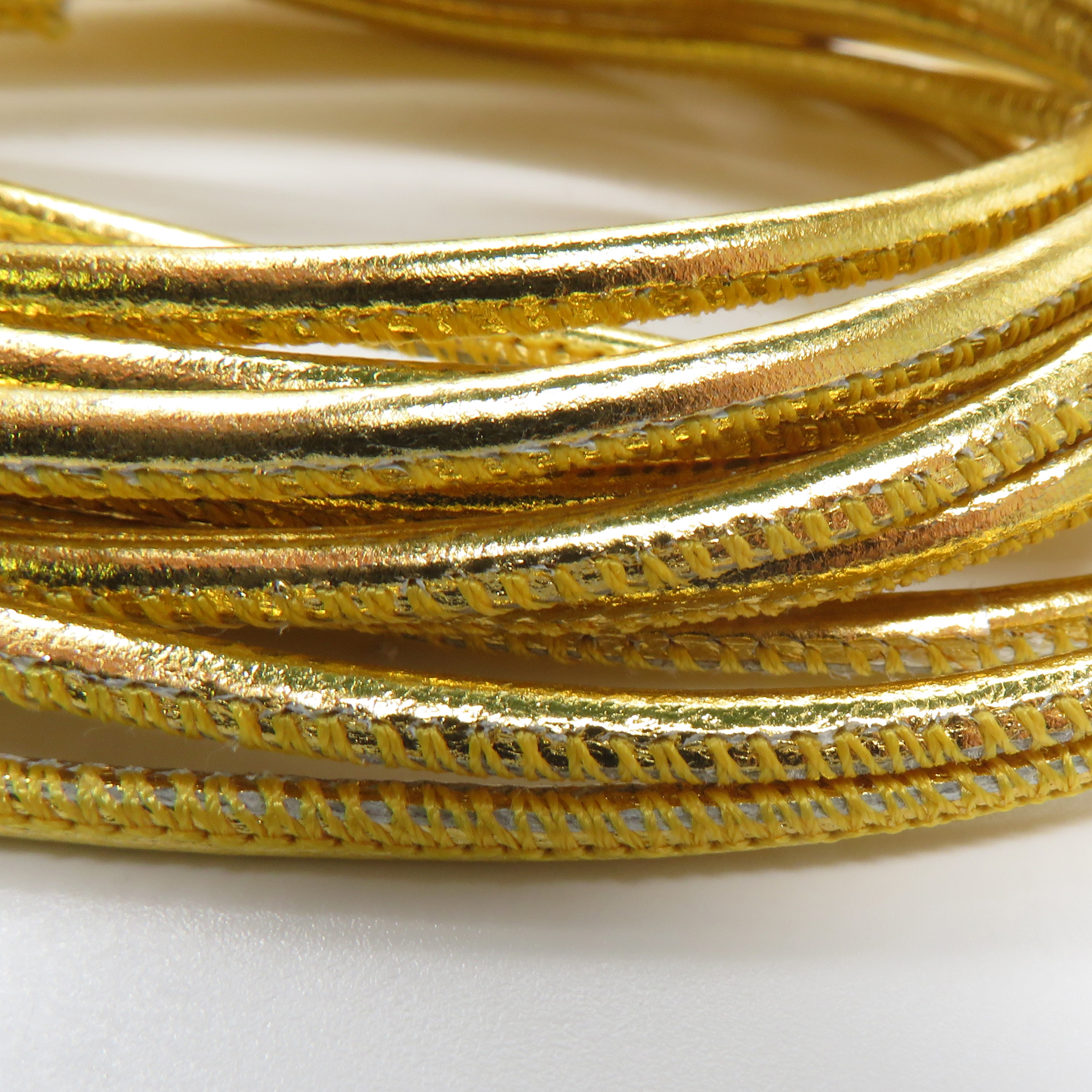Lederschnur Rund gesäumt 2,5 mm - Gold. Länge: 5 m
